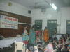 Role play where parents control anger when guests visit house and child is getting problematic.