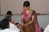 Rashmi Priya distributing Object